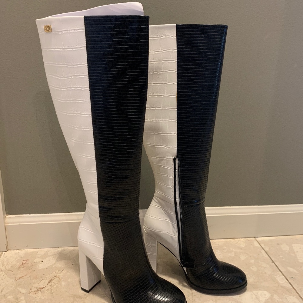 Black and white Calvin Klein boots